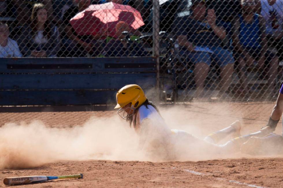 Sierra Vista’s Andrea Barajas (9) slides home for a score against Durango at Sierra Vi ...