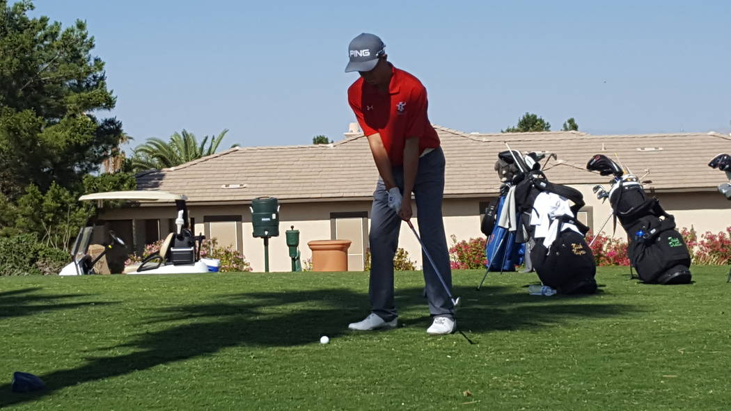 Arbor View’s Hazen Newman prepares to hit his tee shot on the 17th hole during the the ...