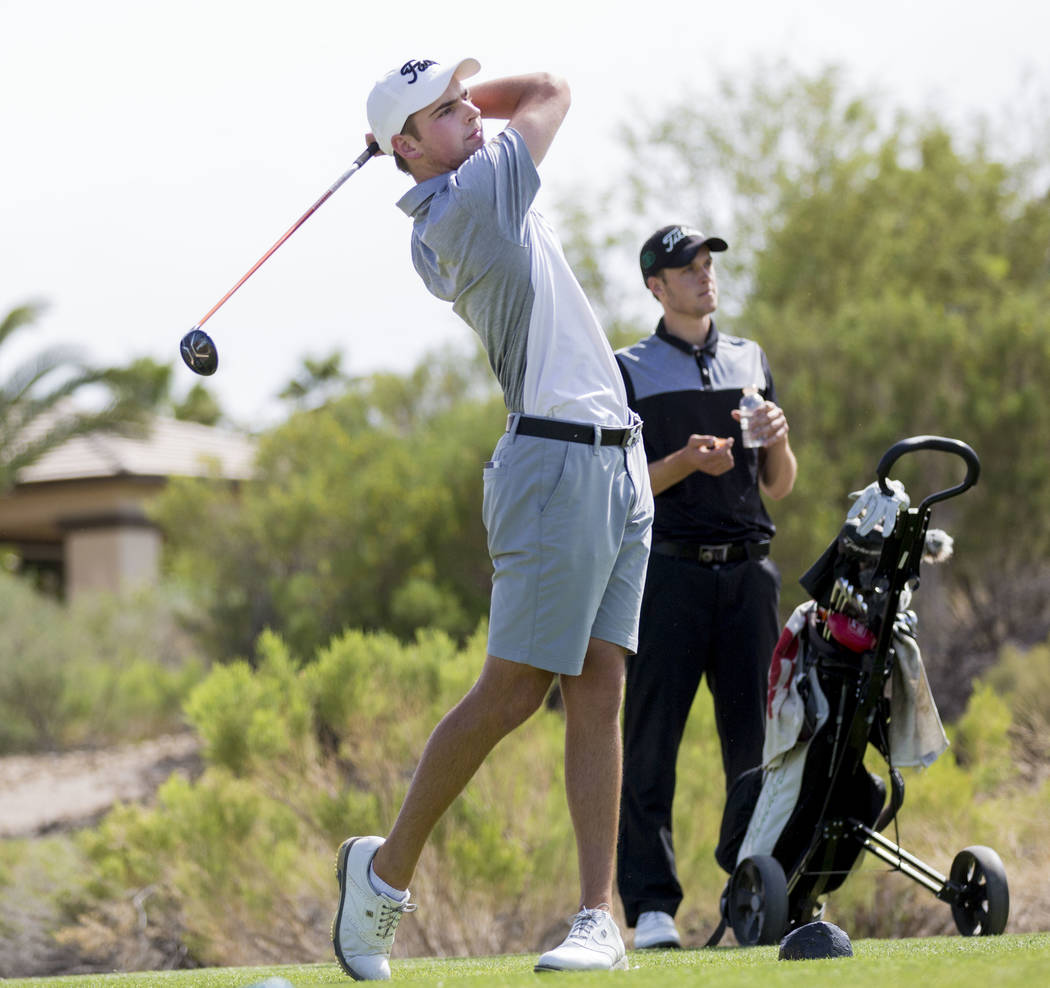 Faith Lutheran’s Charlie Magruder tees off at the 18th hole during Sunset Region boys ...