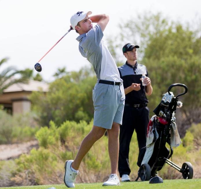 Faith Lutheran’s Charlie Magruder tees off at the 18th hole during Sunset Region boys ...