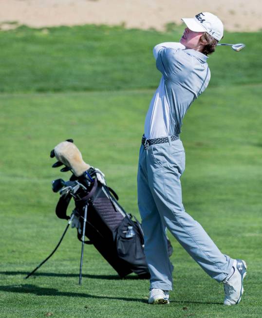 Faith Lutheran’s Jared Ramsay hits his second shot on the 18th hole during the Sunset ...