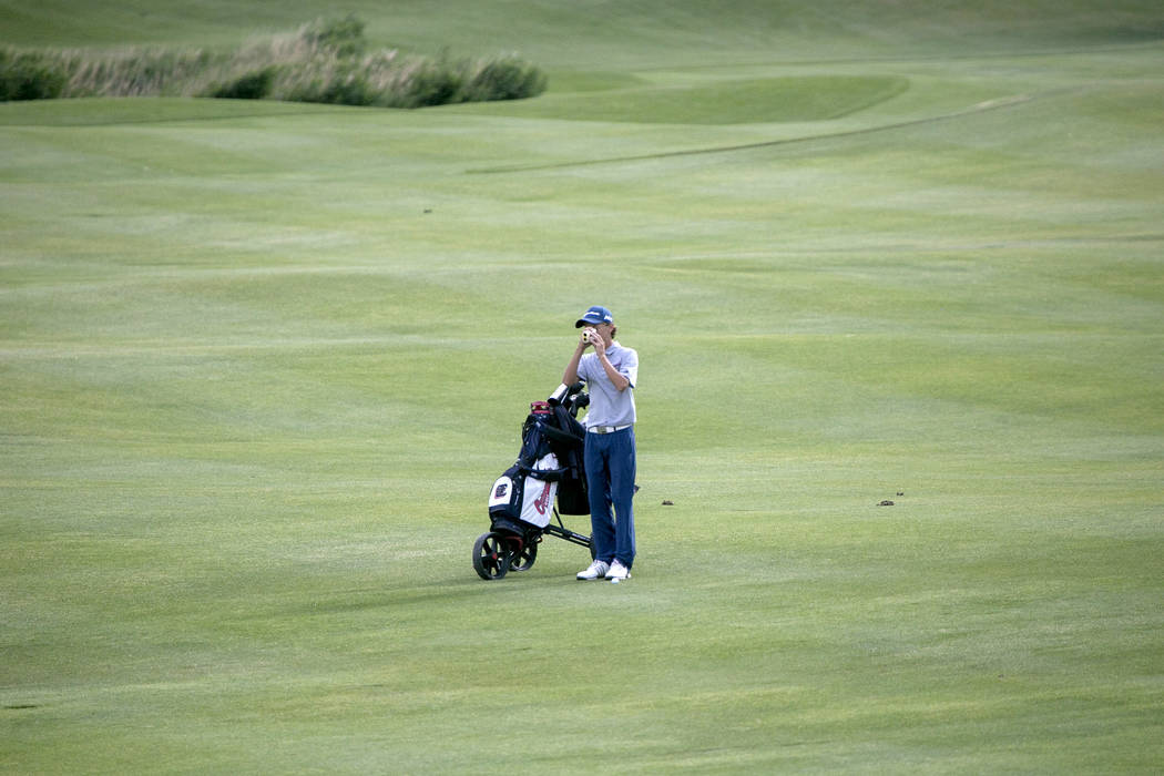 Coronado freshman Brett Sodetz hits the ball on the 18th hole of the Sunrise Region golf tou ...