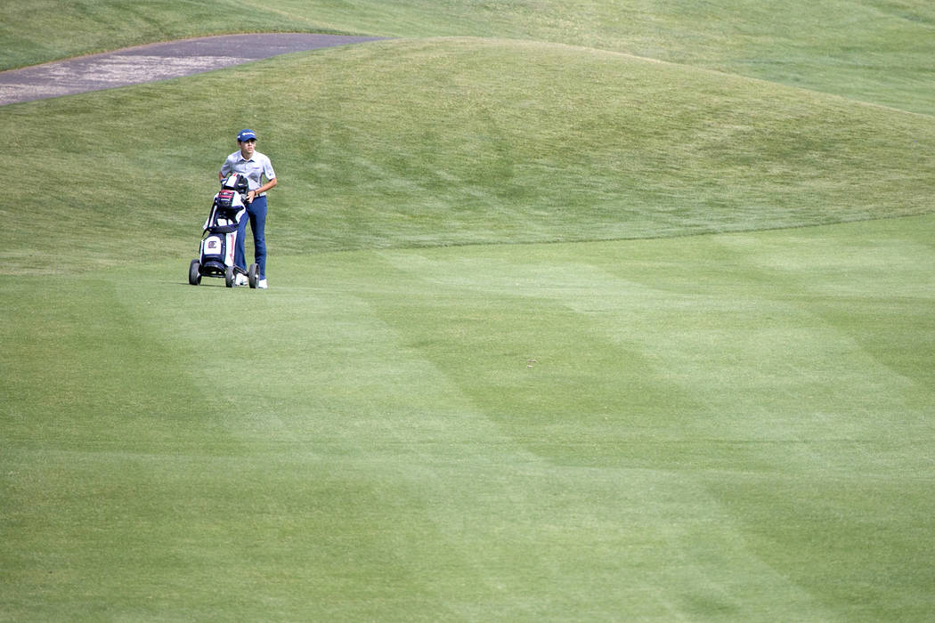 Coronado sophomore Joey Dotta makes his way across the course in part of the Sunrise Region ...