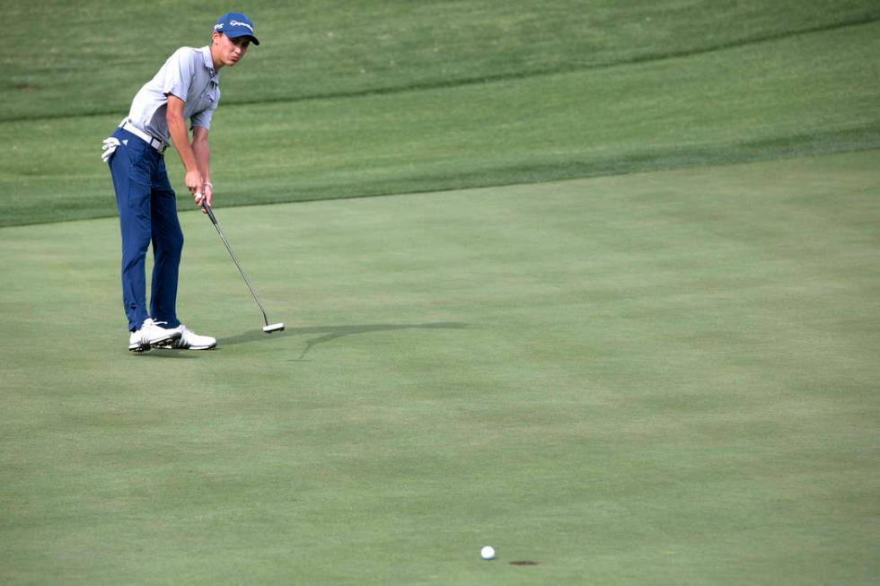 Coronado sophomore Benjamin Sawaia hits the ball on the 14th hole of the Sunrise Region golf ...