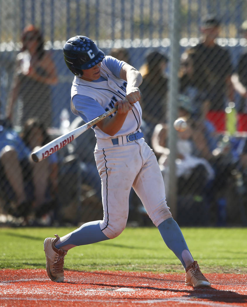 Centennial’s Zack Simon hits a pitch from Desert Oasis during a Sunset Region baseball ...