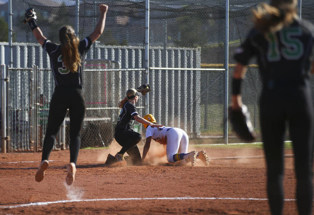 Palo Verde’s Ally Snelling, second from left, tags out Sierra Vista’s Ryan Watki ...