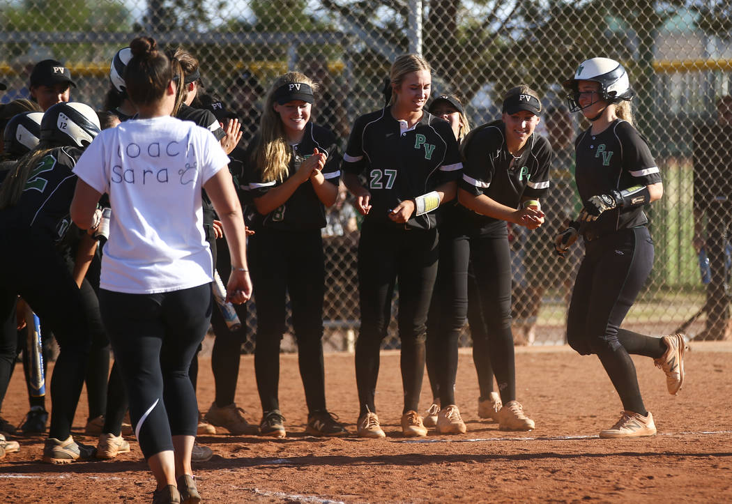 Palo Verde players celebrate a home run against Sierra Vista by Palo Verde’s Lauryn Ba ...