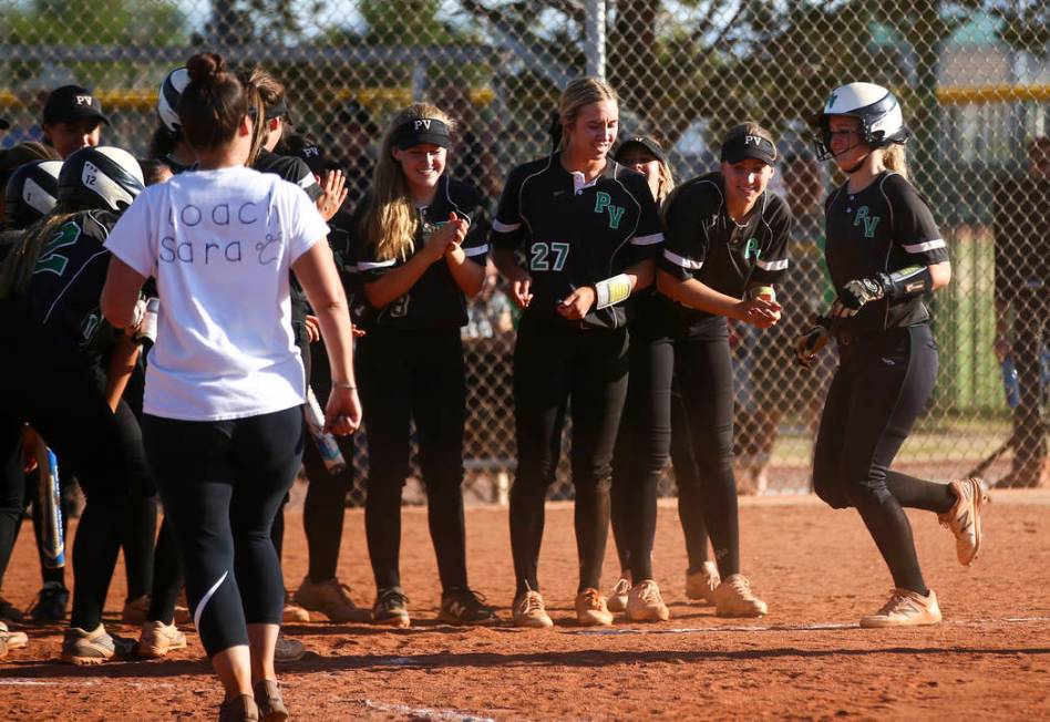 Palo Verde players celebrate a home run against Sierra Vista by Palo Verde’s Lauryn Ba ...