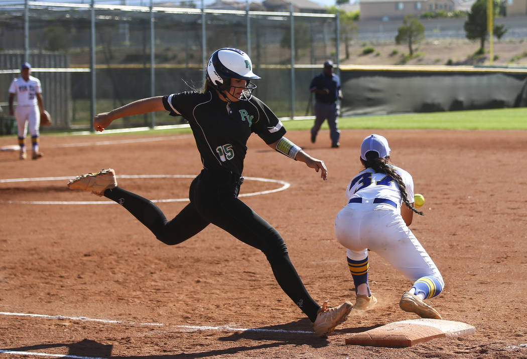 Palo Verde’s Makena Martin (15) makes it to first base against Sierra Vista’s Ho ...