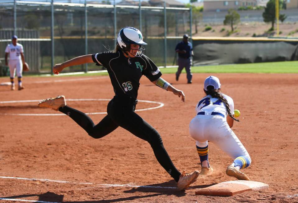 Palo Verde’s Makena Martin (15) makes it to first base against Sierra Vista’s Ho ...