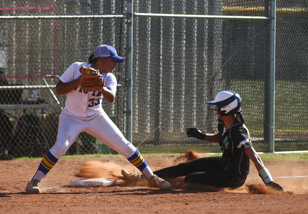 Palo Verde’s Camden Zahn, right, slides safely into third base against Sierra Vista&#8 ...