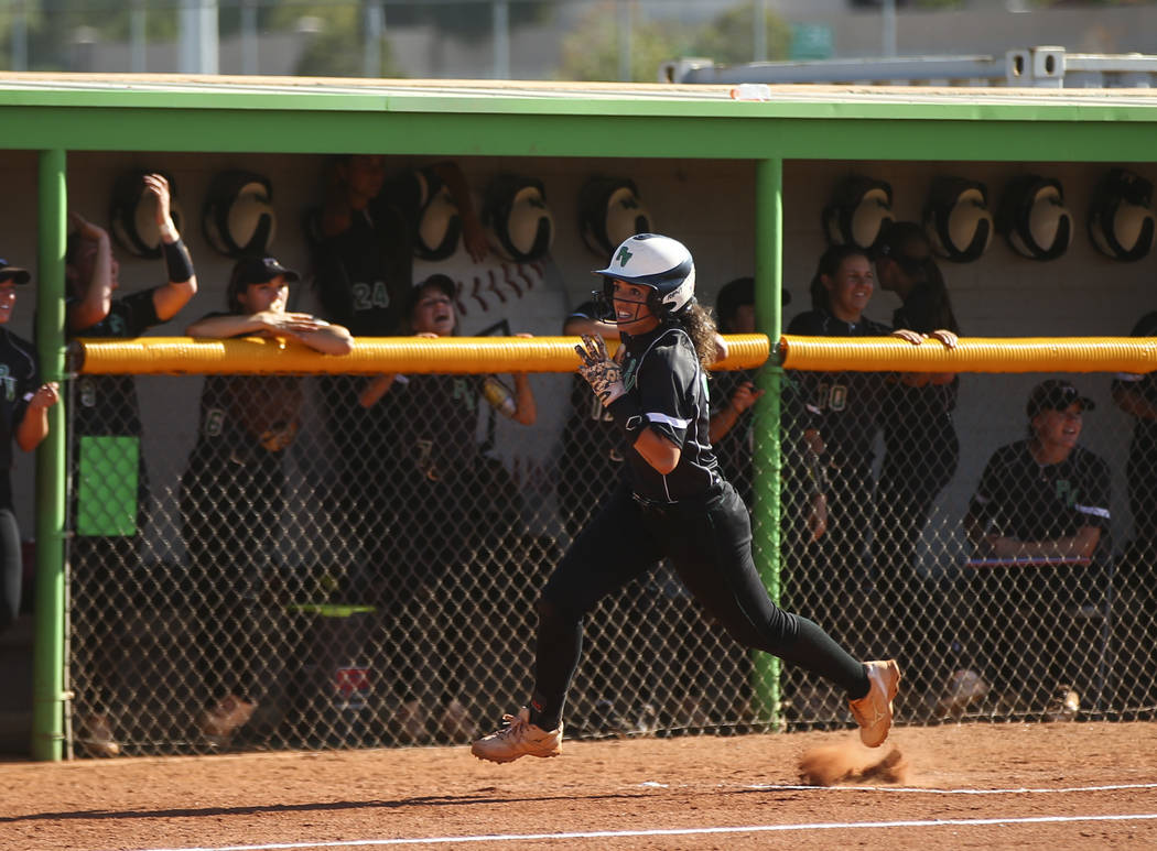 Palo Verde’s Cara Beatty (5) heads to home base to score a run against Sierra Vista du ...