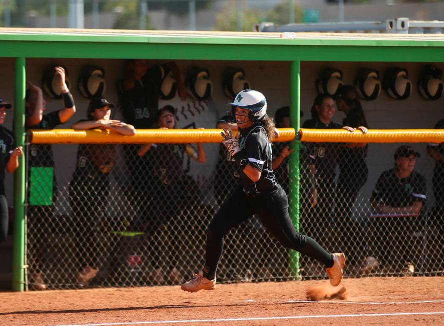 Palo Verde’s Cara Beatty (5) heads to home base to score a run against Sierra Vista du ...