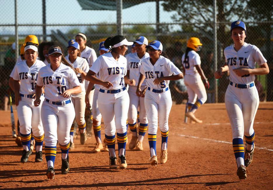 Sierra Vista players return to the dugout after a home run hit by Sierra Vista’s Jessi ...