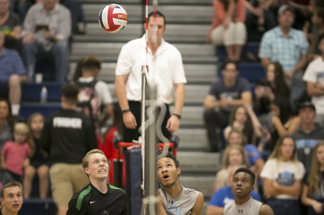 Palo Verde players, left, prepare to receive the ball from Centennial players, right, during ...