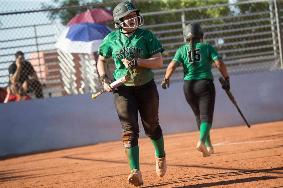 Rancho’s Gianna Carosone (66) reacts after scoring a run against Liberty at Foothill H ...