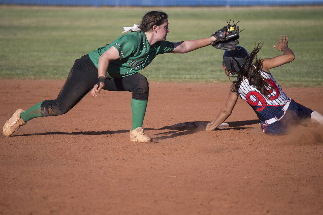 Rancho’s Gianna Carosone (66) is late to tag Liberty’s Jasmine Gonzalez (99) at ...