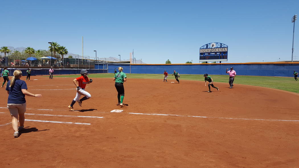 Coronado’s Ashley Ward is unable to beat the throw to first after grounding out to end ...