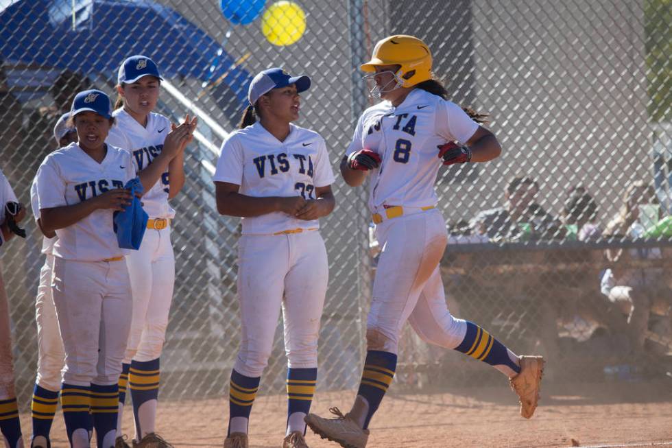 Sierra Vista’s Kalei Watkins (8) runs home after hitting a homerun against Durango at ...