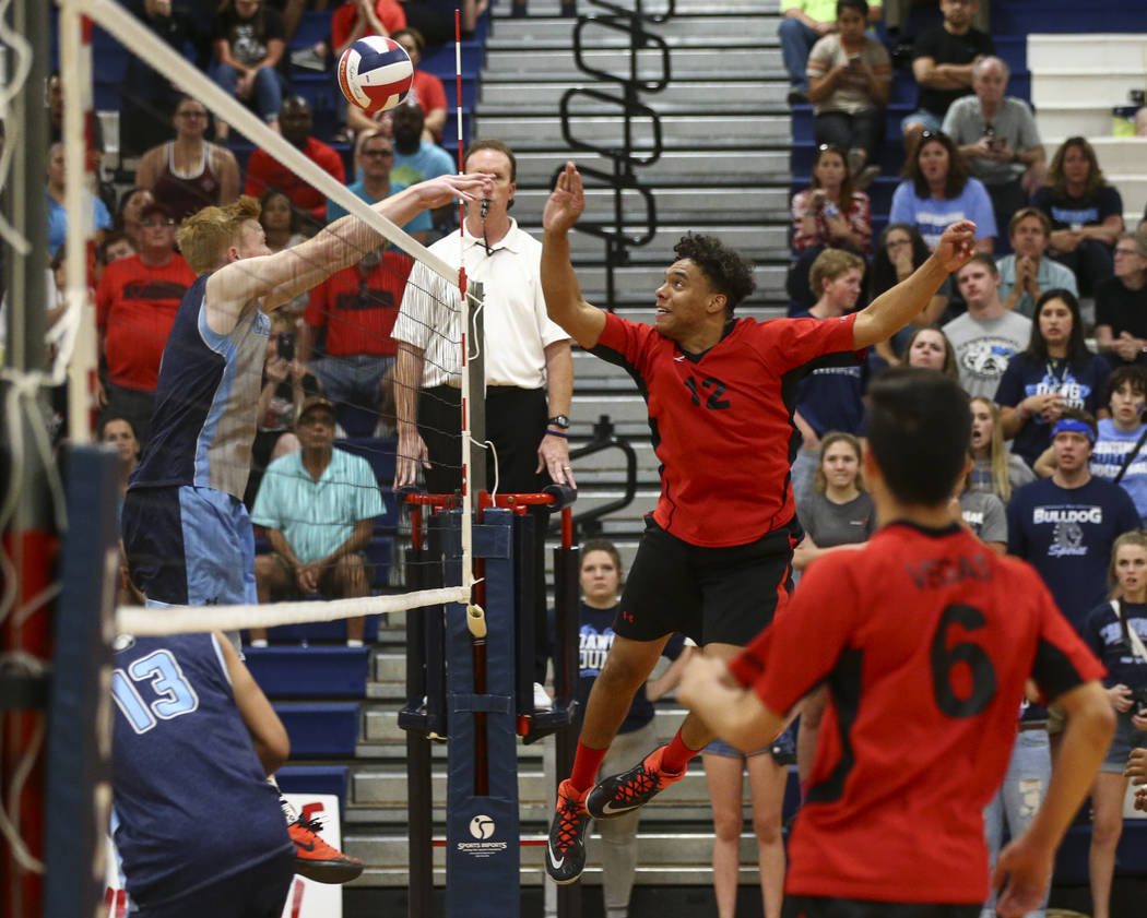 Las Vegas’ Romeo Gray (12) sends the ball to Centennial during the Class 4A boys state ...