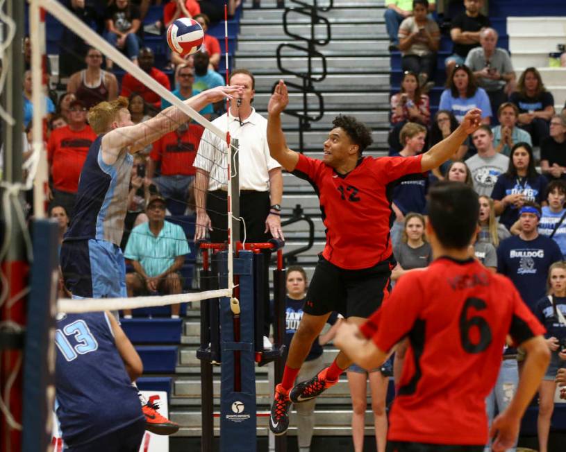 Las Vegas’ Romeo Gray (12) sends the ball to Centennial during the Class 4A boys state ...