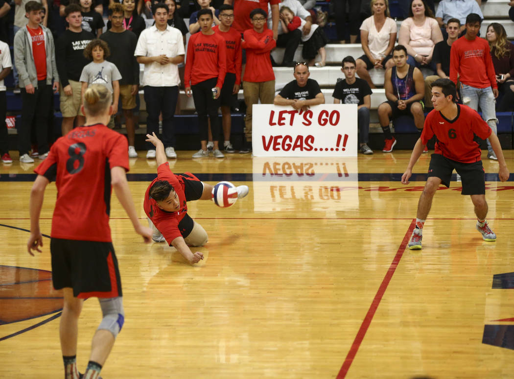 Las Vegas’ Foster Palo dives to save the ball during the Class 4A boys state semifinal ...