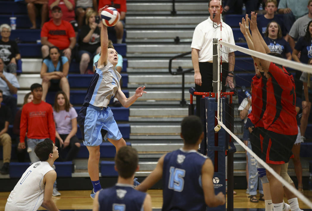 Centennial’s Justin Madsen (6) sends the ball to Las Vegas during the Class 4A boys st ...