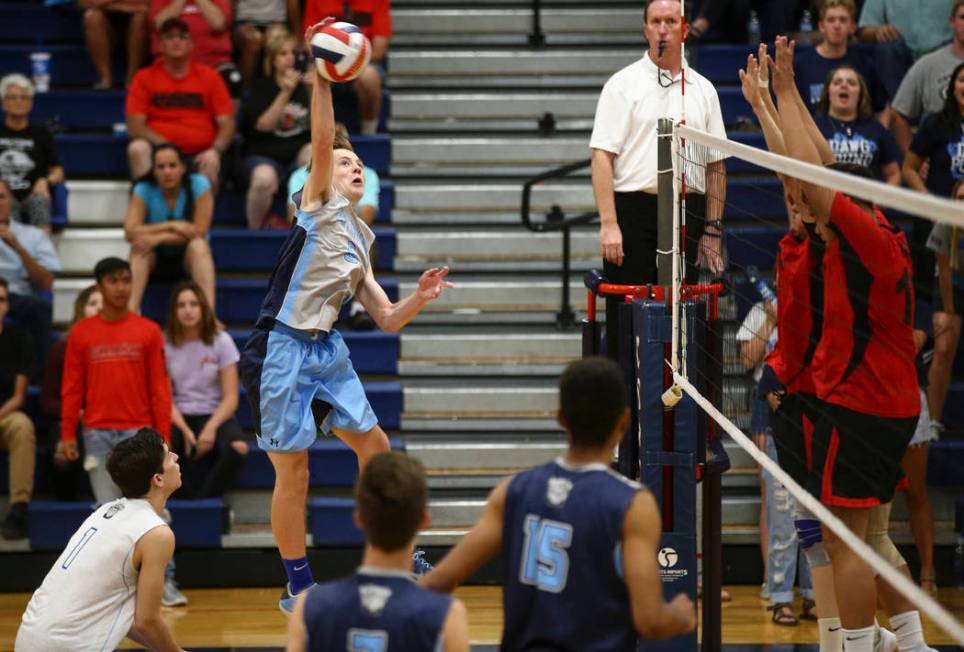 Centennial’s Justin Madsen (6) sends the ball to Las Vegas during the Class 4A boys st ...