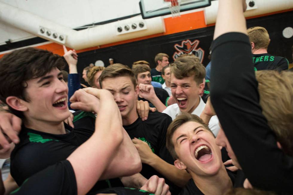 Palo Verde celebrates their win over Las Vegas High during the Class 4A state volleyball fin ...