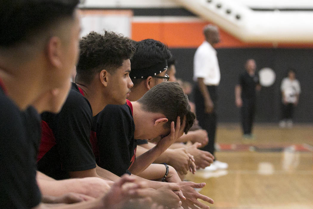 Las Vegas players react to a play during the Class 4A state volleyball final at Chaparral Hi ...