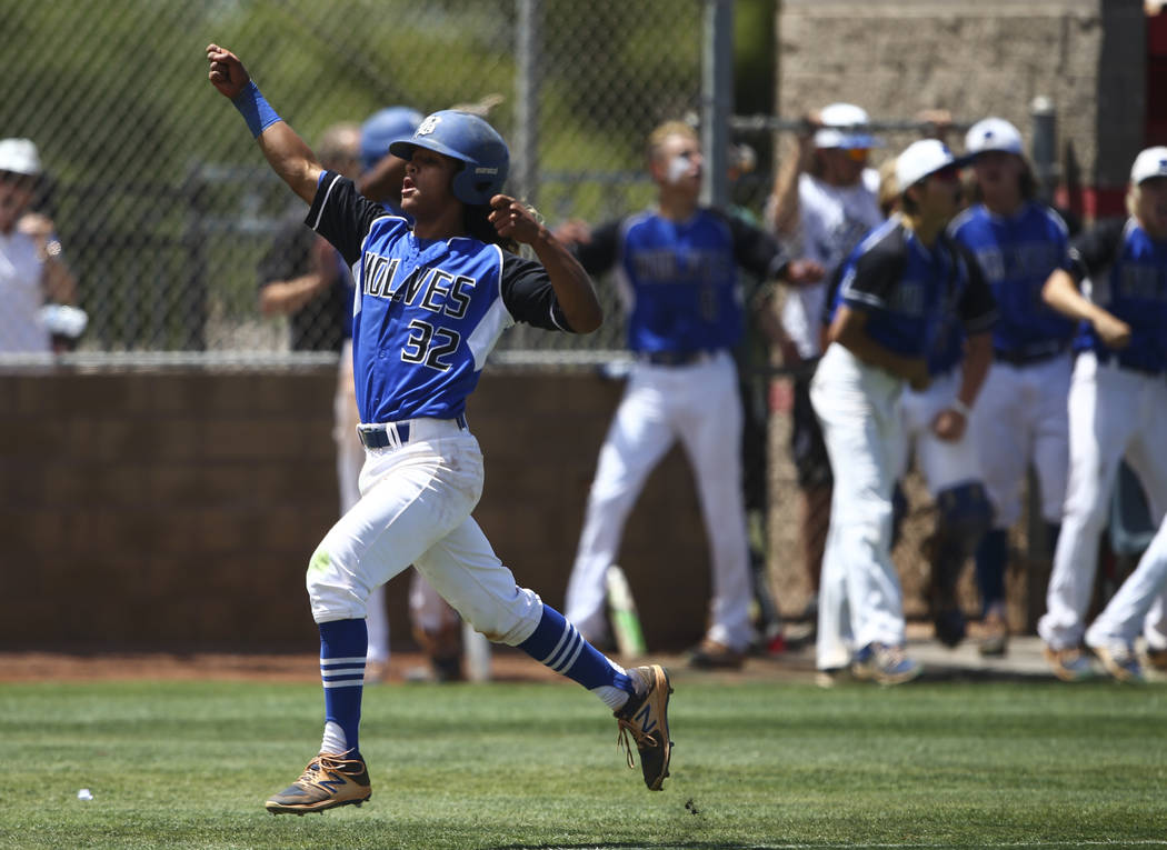 Basic’s Christian Rivero (32) reacts on his way to score a run against Galena during a ...