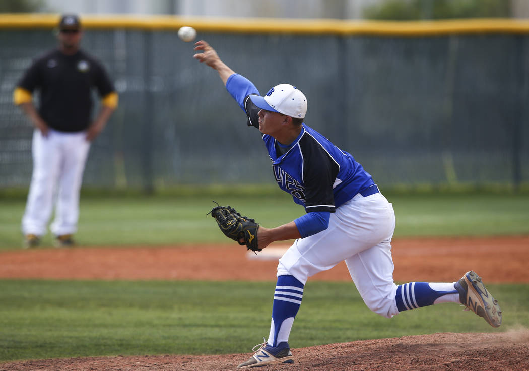 Basic’s C.J. Dornak pitches to Galena during a Class 4A state baseball tournament game ...