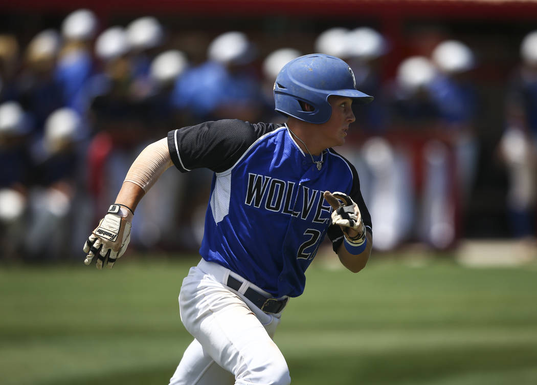 Basic’s Paul Myro runs for first base during a Class 4A state baseball tournament game ...