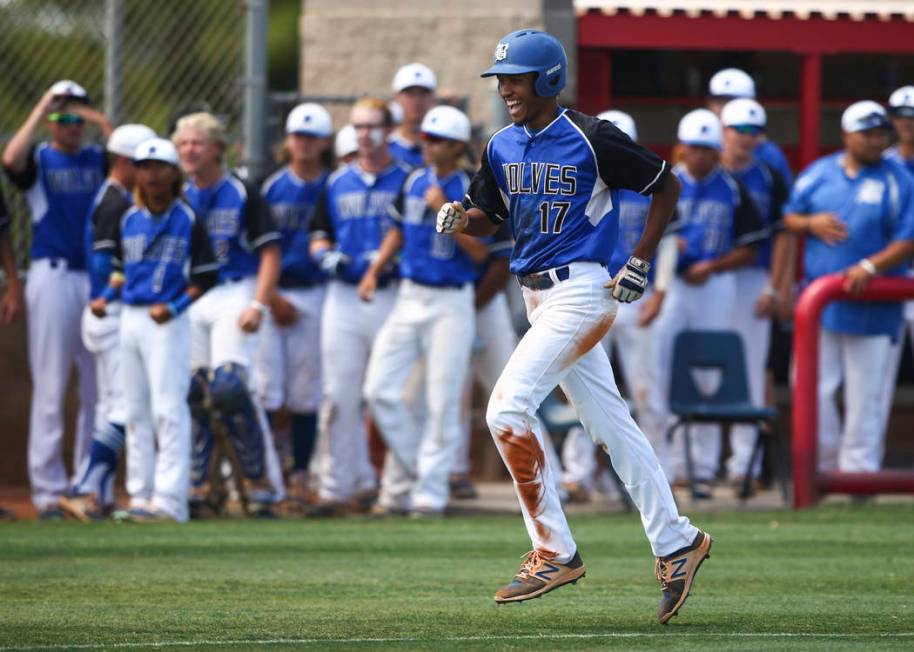 Basic’s Garrett Giles (17) rounds the bases on a home run against Galena during a Clas ...