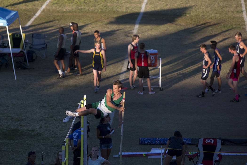 Virgin Valley junior Brogan Bingham warms up for the 3A boys pole vault at the NIAA State Tr ...