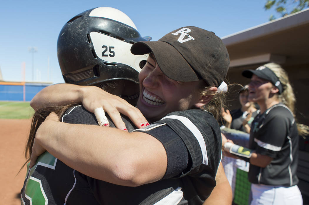 Palo Verde junior Makall Whetten, right, hugs junior Grace Chavez, left, in reaction to Chav ...