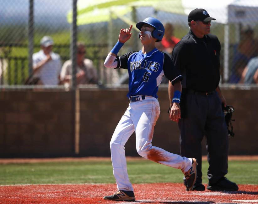 Basic’s John Howard Bobo (6) scores a run against Rancho during a Class 4A state baseb ...