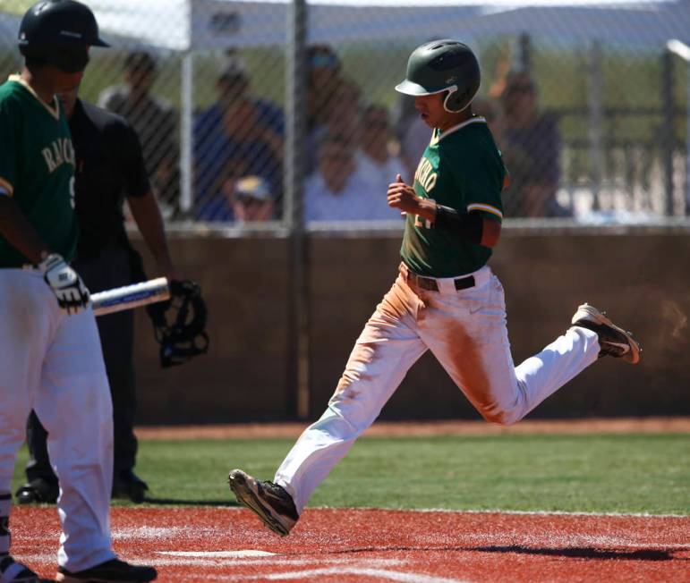 Rancho’s Anthony Guzman (27) scores a run against Basic during a Class 4A state baseba ...