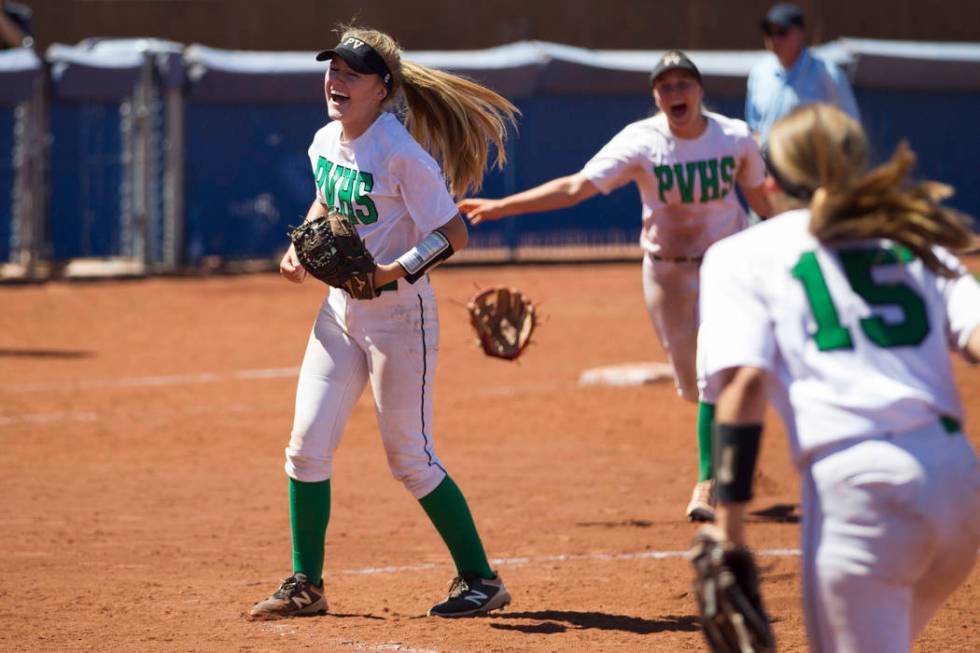 Palo Verde’s Kendall Hopkins (8), left, reacts after a strikeout to win against Reed i ...