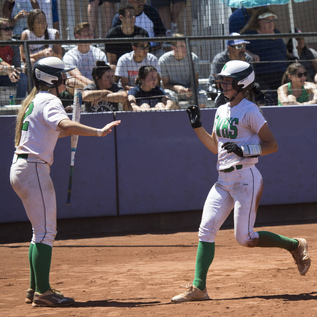 Palo Verde’s Camden Zahn (27) runs home for a run against Reed in the Nevada Class 4A ...