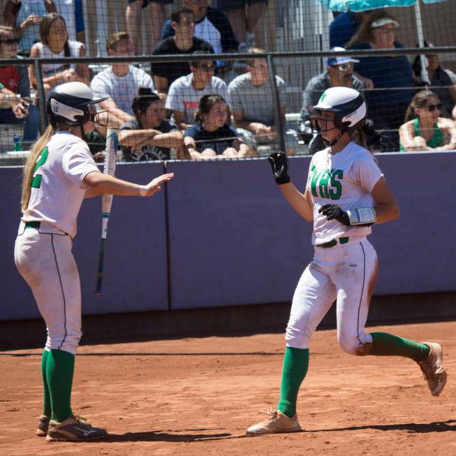 Palo Verde’s Camden Zahn (27) runs home for a run against Reed in the Nevada Class 4A ...