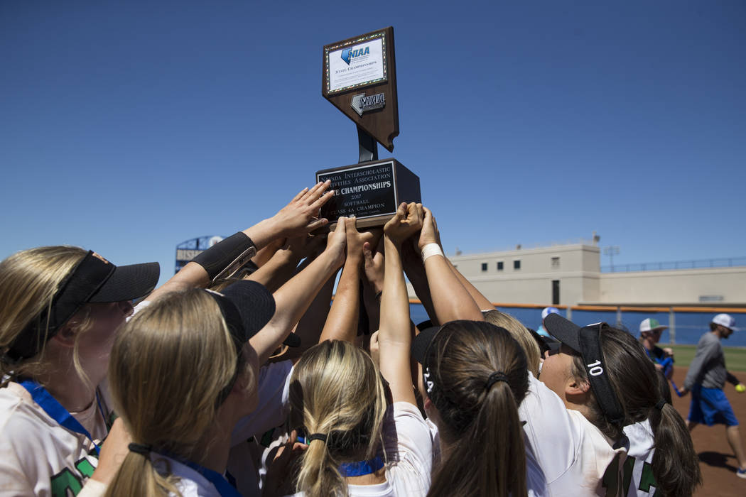 Palo Verde celebrate their 9-3 win against Reed in the Nevada Class 4A state softball final ...