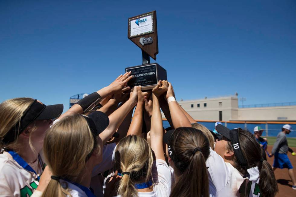 Palo Verde celebrate their 9-3 win against Reed in the Nevada Class 4A state softball final ...