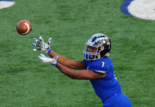 Desert Pines wide receiver Isaiah Morris catches a pass against Spring Creek in the second h ...