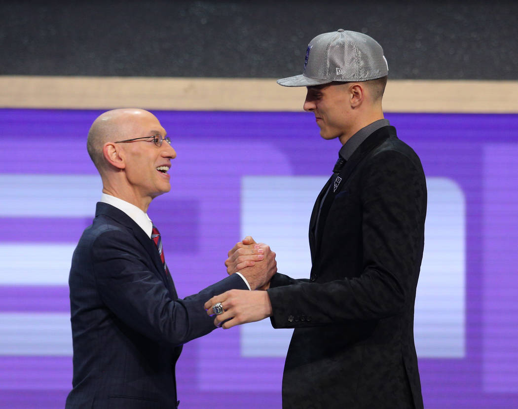 Jun 22, 2017; Brooklyn, NY, USA; Zach Collins (Gonzaga) is introduced by NBA commissioner Ad ...