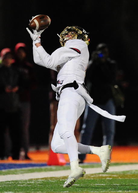 Faith Lutheran wide receiver Elijah Kothe catches a first down pass against Bishop Gorman in ...