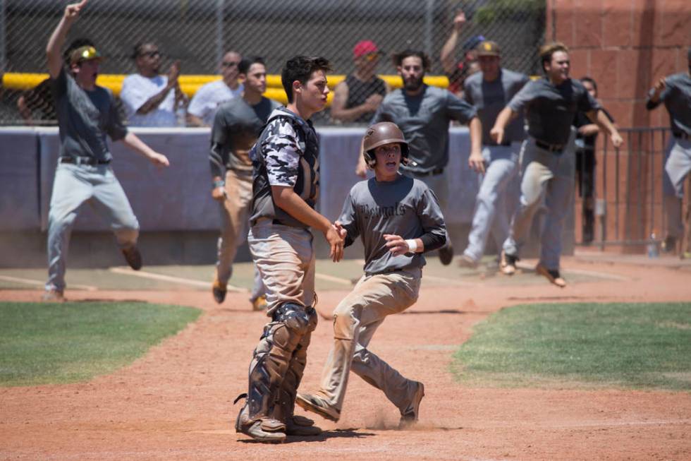 Bengals’ Nick DeSoto (10), right, runs to score the tying run run against Las Vegas Mu ...