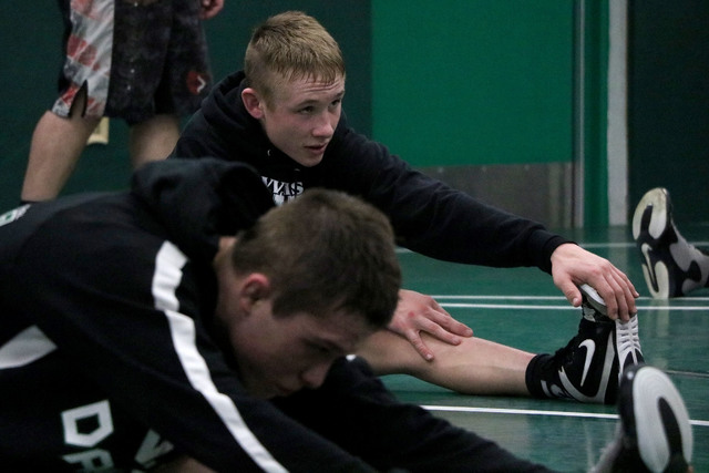 Virgin Valley wrestler Jacob Baird, front, leads stretch in front of Ty Smith at practice, V ...