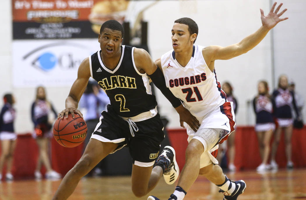 Clark guard Sedrick Hammond (2) drives to the basket against Coronado’s Freddy Reeves ...