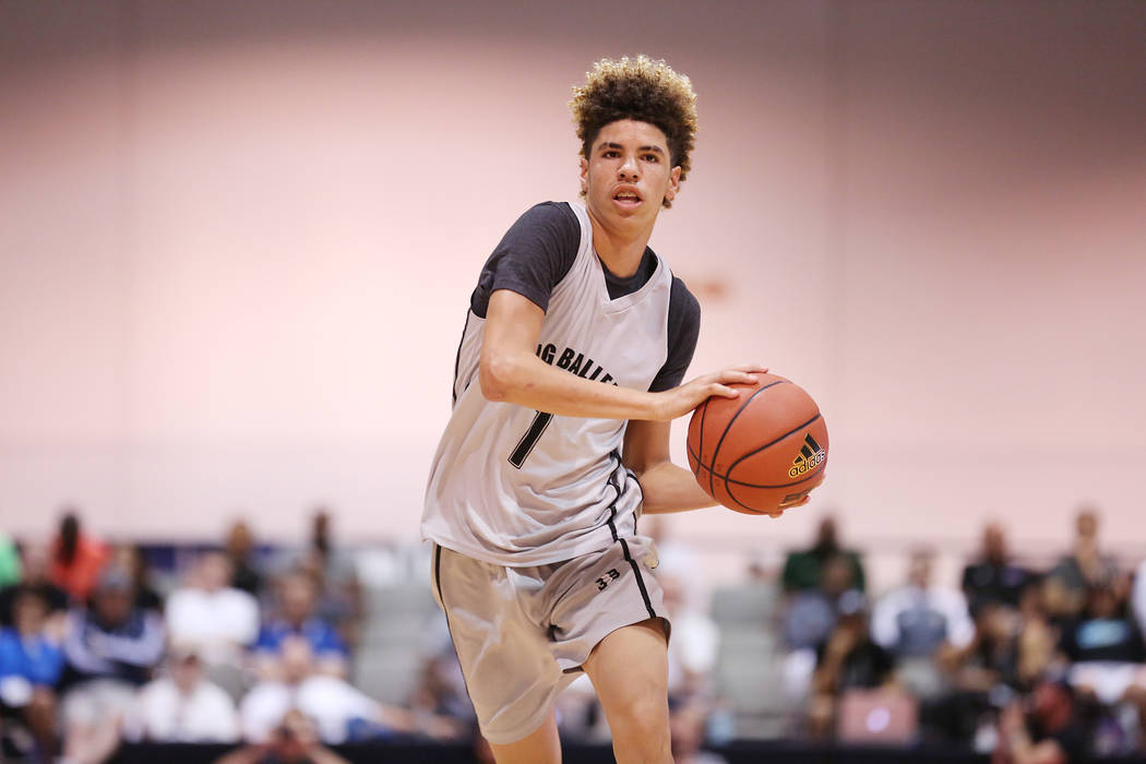 Big Baller Brand player LaMelo Ball handles the ball during an Adidas Summer Championship AA ...